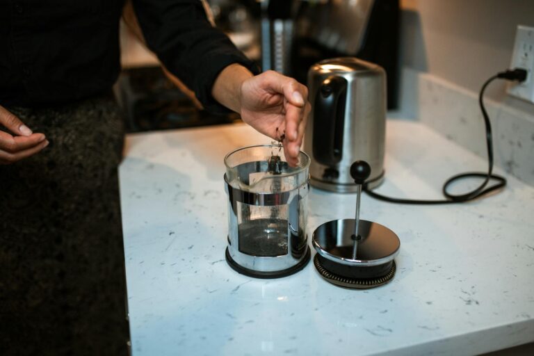 How to Clean a French Press So Old Oils Don't Linger - Featured image